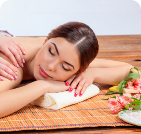 A therapist performing a relaxing full-body massage at a wellness center.