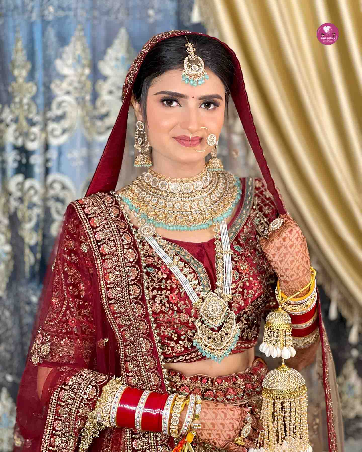 Bride with flawless makeup and elegant hairstyle showcasing the best bridal makeup in Duba