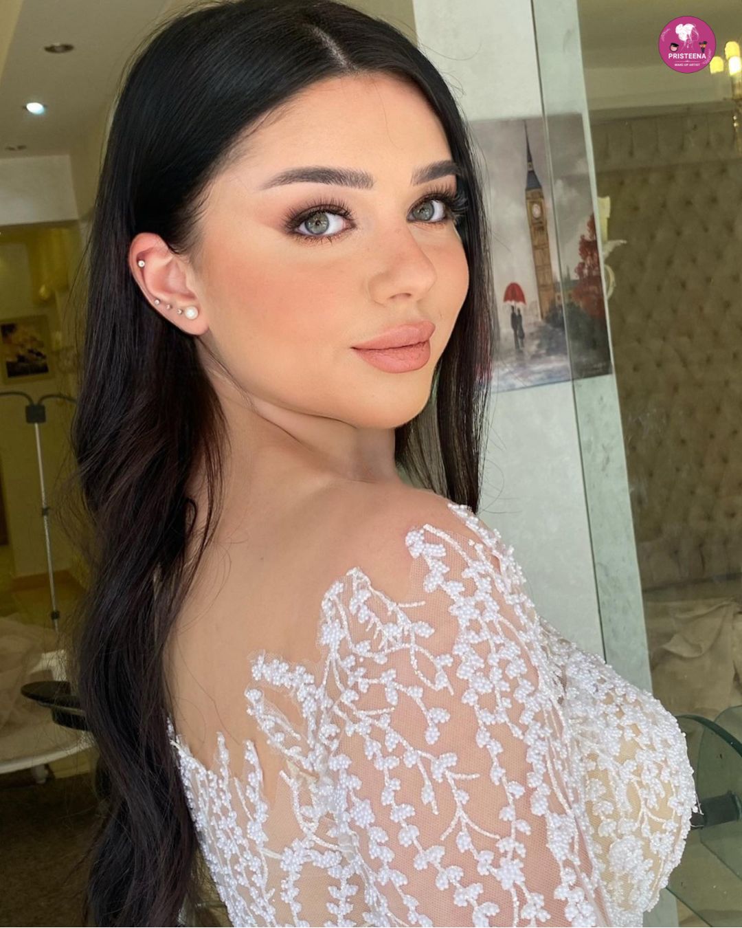 Bride getting makeup done by the best wedding makeup artist in Dubai, showcasing flawless bridal glam.