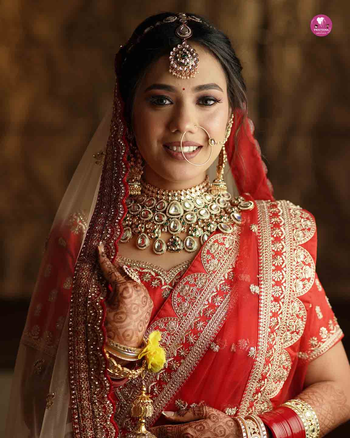 Bride getting ready with flawless wedding makeup in Dubai salon