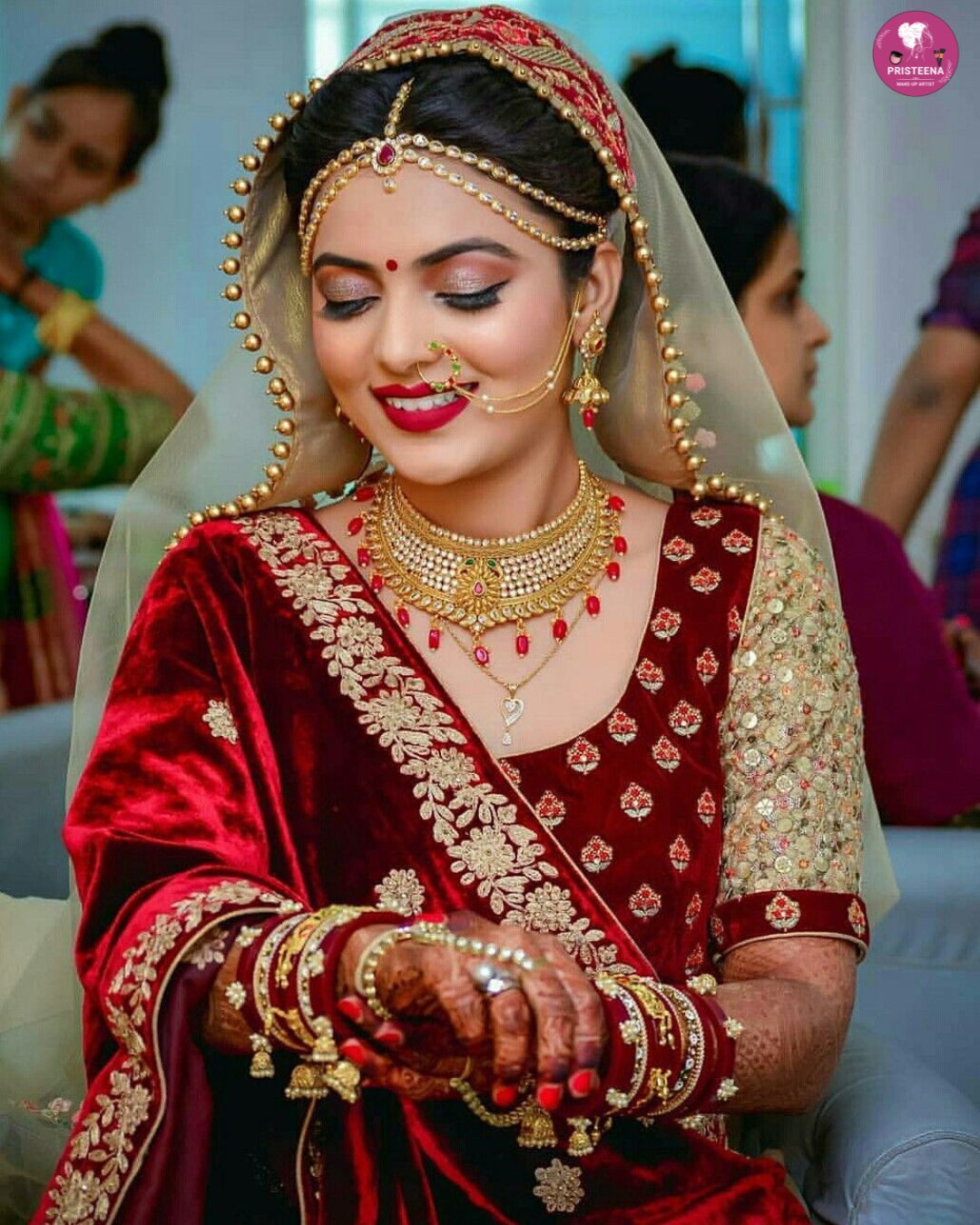 Bridal makeup artist in Dubai applying flawless wedding makeup to a bride