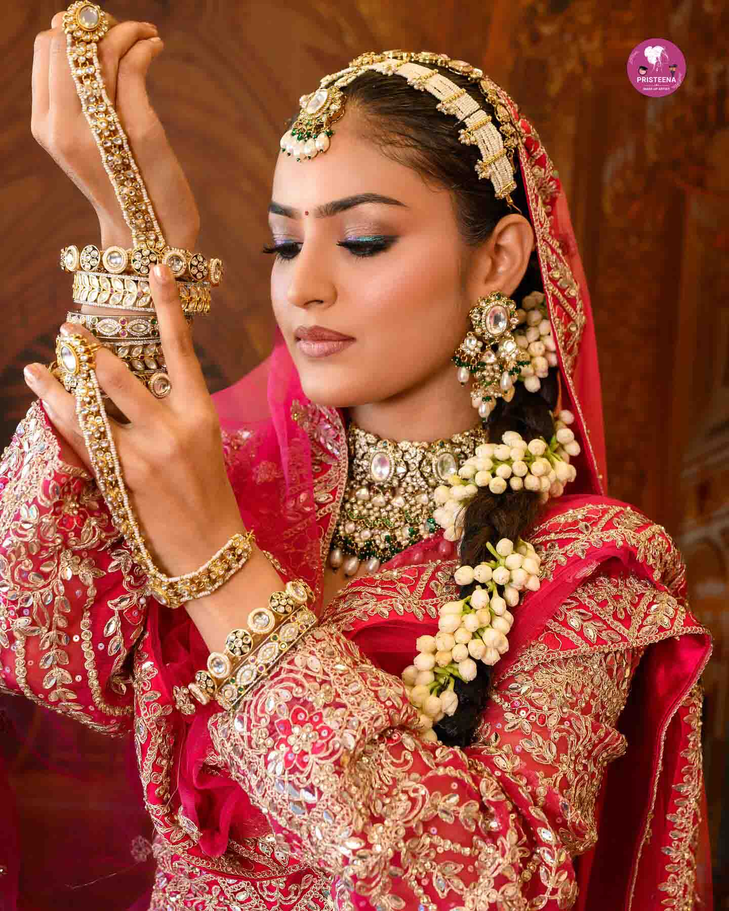 Indian bride with traditional bridal makeup and jewelry in Dubai