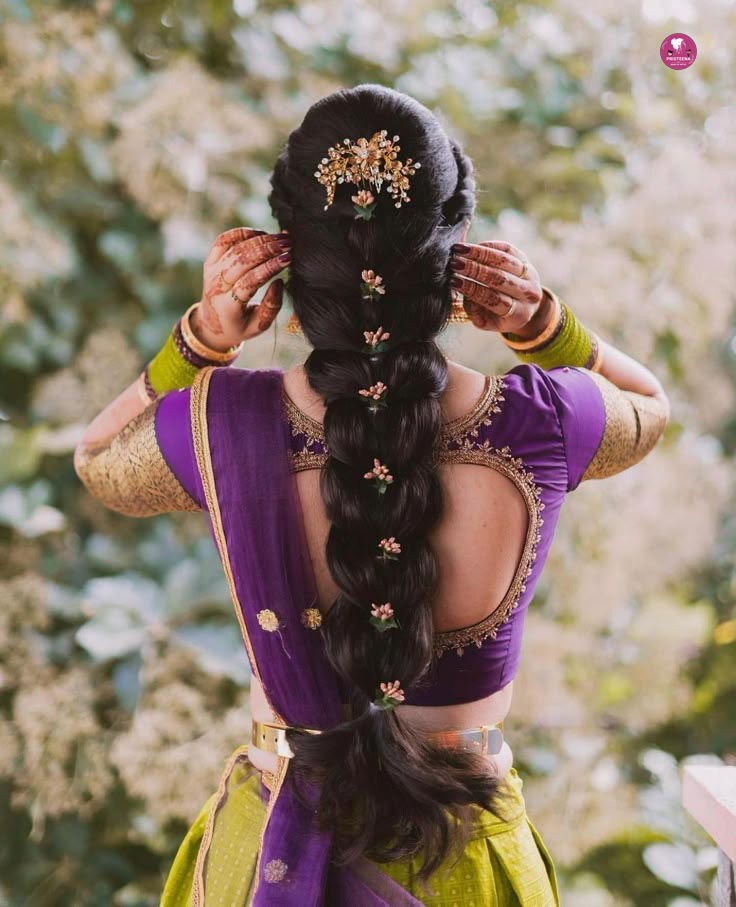 South Indian bridal hairstyle with traditional flowers and jewelry in Dubai