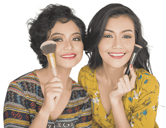 A happy woman receiving beauty treatment at home from a professional home salon service.