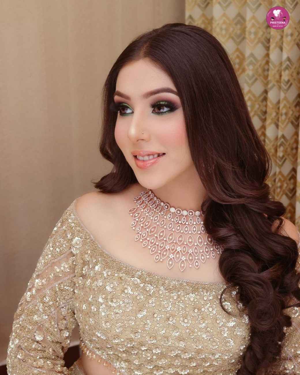 Affordable event makeup artist in UAE applying flawless makeup to a client before a special occasion