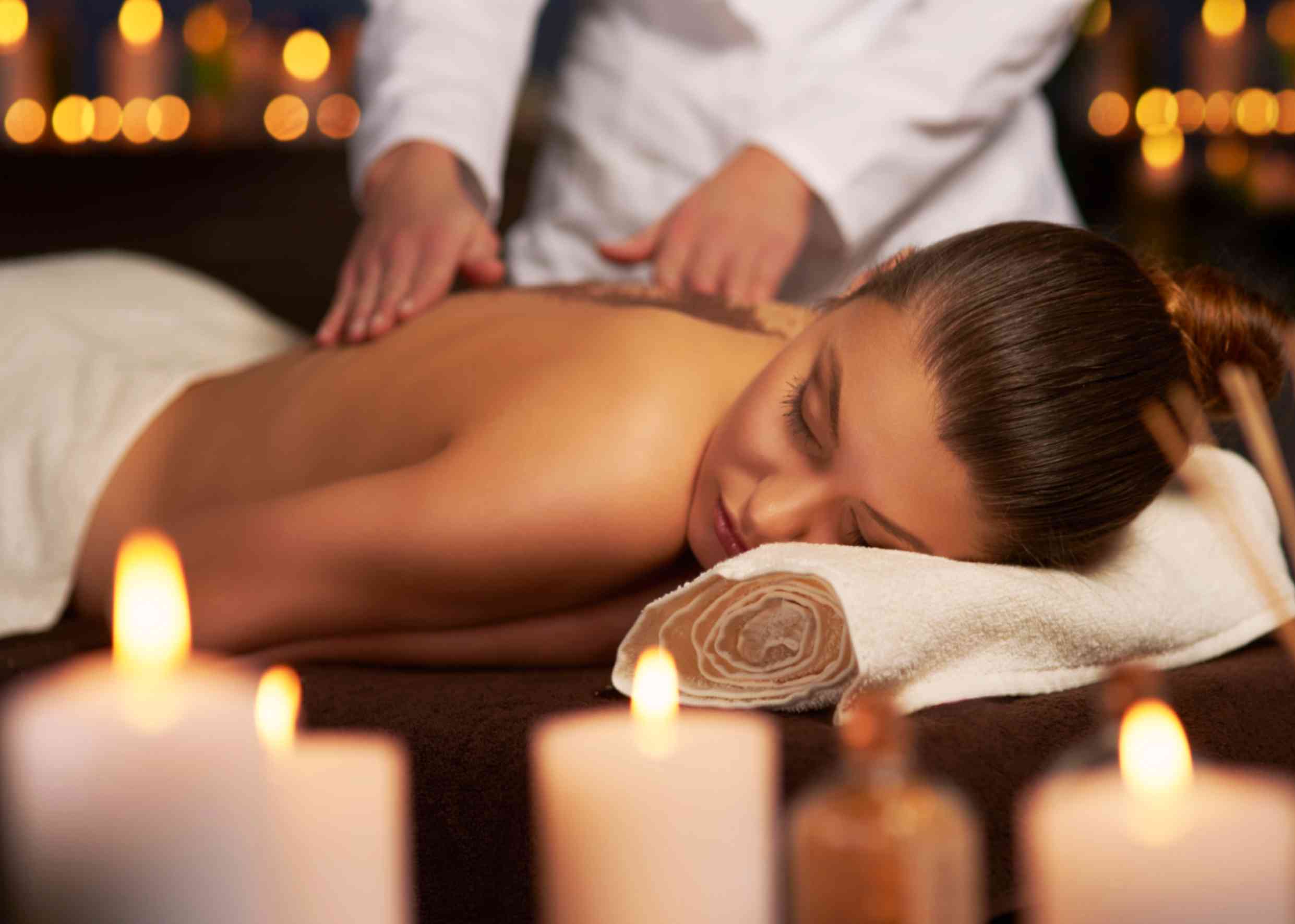 a female client getting swedish massage at home in dubai