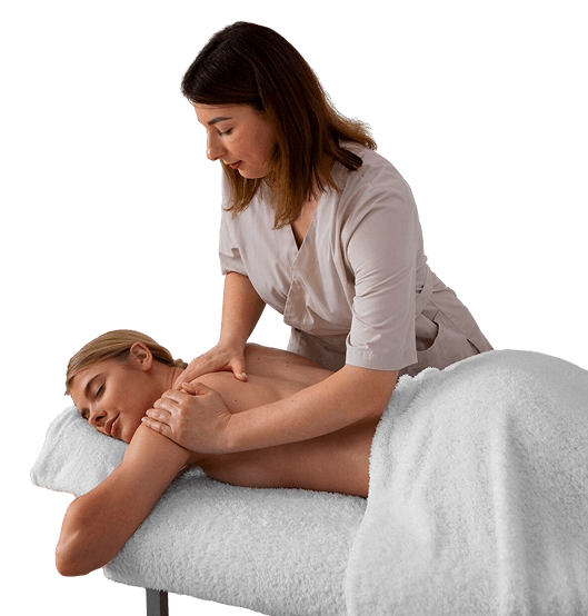 a female client getting massage on her back from a female massage therapist