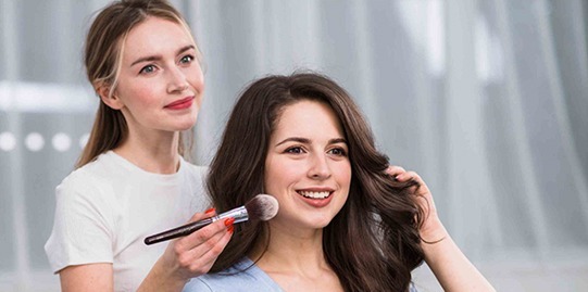 A woman having her Makeup